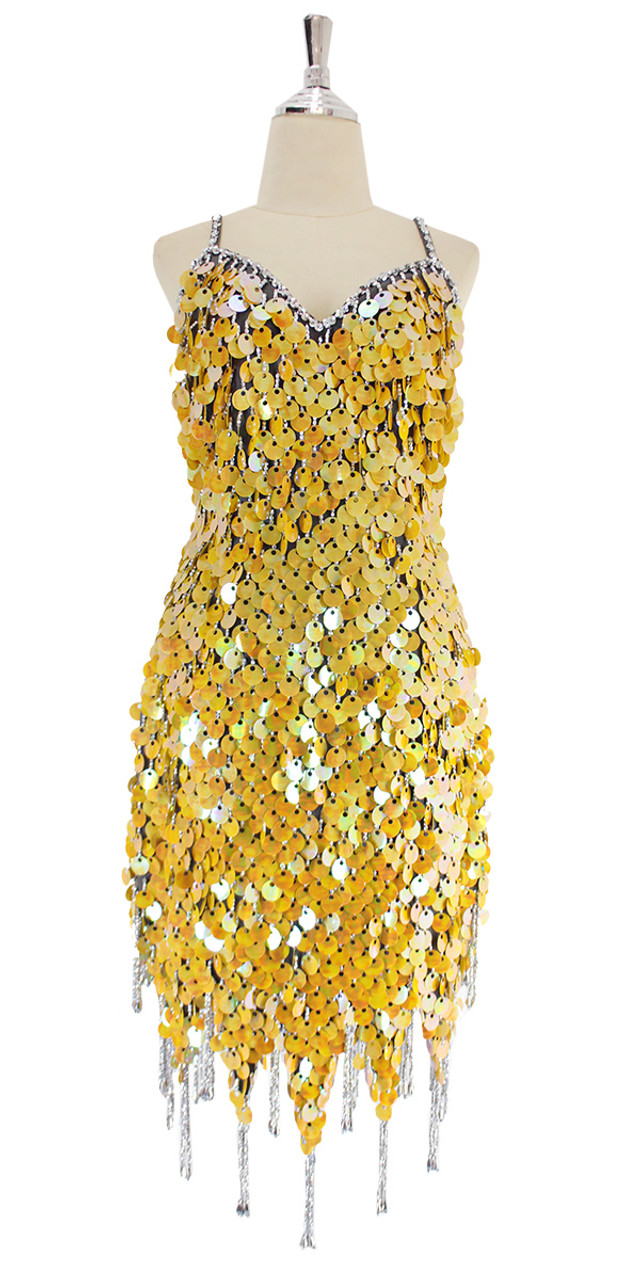 A short handmade sequin dress, in ...